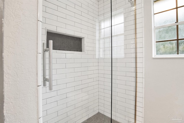 9852 Hillview Dr, Pensacola, FL 32514 - full bath with tiled shower and a textured wall