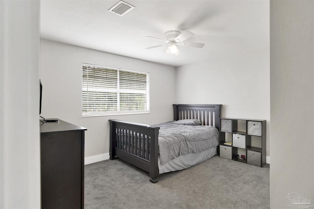 9852 Hillview Dr, Pensacola, FL 32514 - bedroom featuring carpet, baseboards, and a ceiling fan