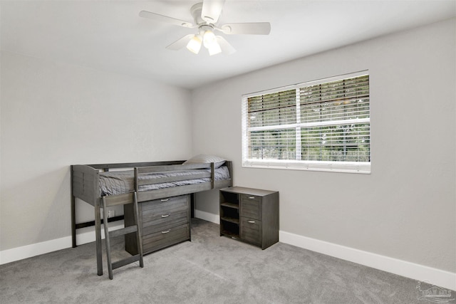 9852 Hillview Dr, Pensacola, FL 32514 - unfurnished bedroom with carpet, baseboards, and ceiling fan