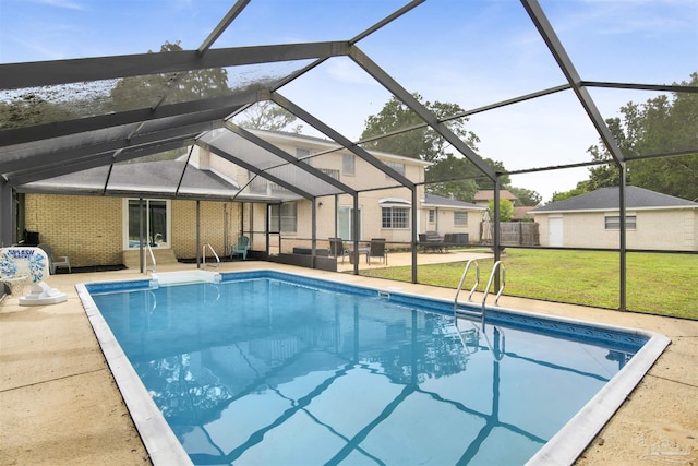 9852 Hillview Dr, Pensacola, FL 32514 - outdoor pool with a patio, a lawn, and glass enclosure