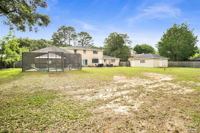 9852 Hillview Dr, Pensacola, FL 32514 - view of yard featuring a lanai