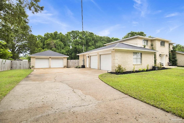 9852 Hillview Dr, Pensacola, FL 32514 - view of home's exterior featuring brick siding and a garage
