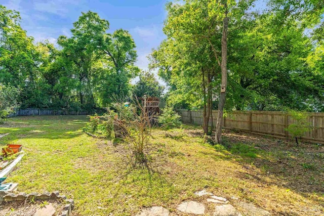 view of yard featuring fence