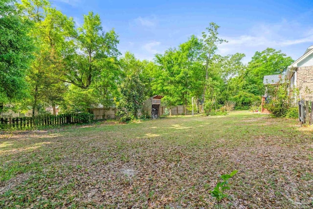 view of yard featuring fence