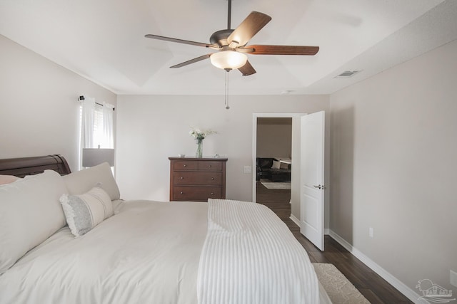 bedroom featuring dark wood-type flooring and ceiling fan