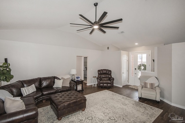 living room with dark wood-type flooring, ceiling fan, and vaulted ceiling