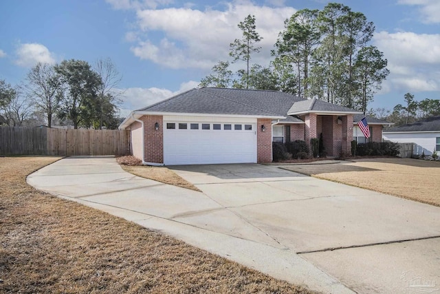 ranch-style house featuring a garage, concrete driveway, brick siding, and fence