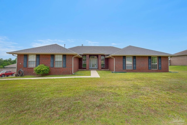 ranch-style home with a front yard