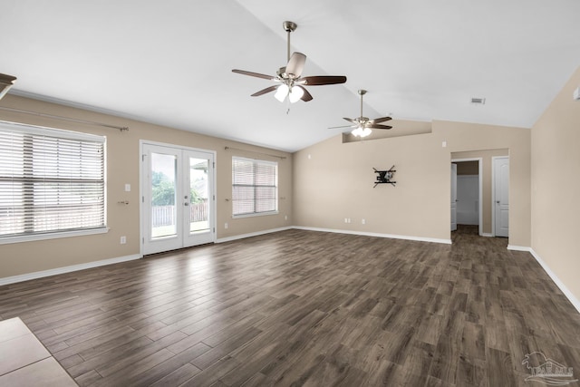 unfurnished living room with dark hardwood / wood-style floors, ceiling fan, lofted ceiling, and french doors