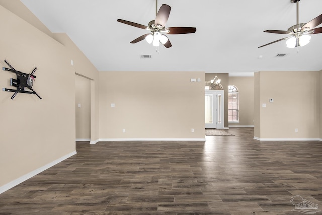 unfurnished living room featuring ceiling fan with notable chandelier, wood-type flooring, and lofted ceiling