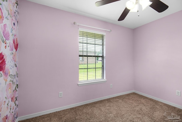 carpeted empty room with ceiling fan