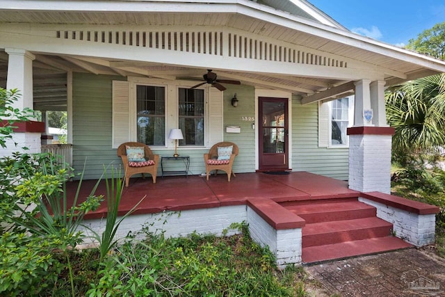 doorway to property with ceiling fan and covered porch