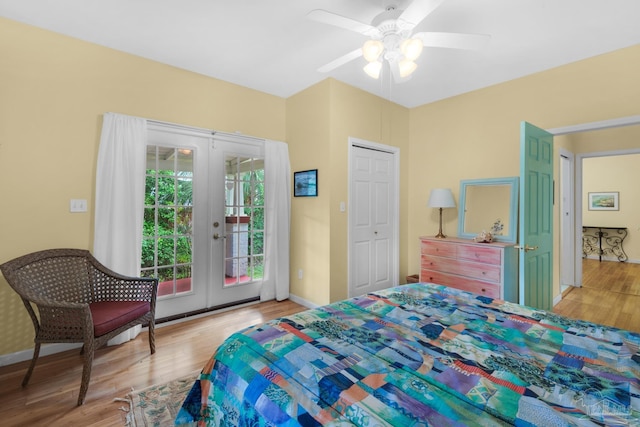 bedroom with ceiling fan, light hardwood / wood-style floors, french doors, and access to exterior