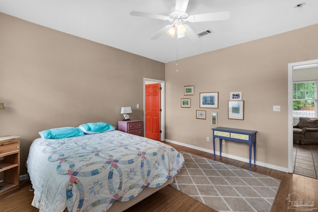 1325 N 15th Ave, Pensacola, FL 32503 - bedroom featuring visible vents, ceiling fan, wood finished floors, and baseboards