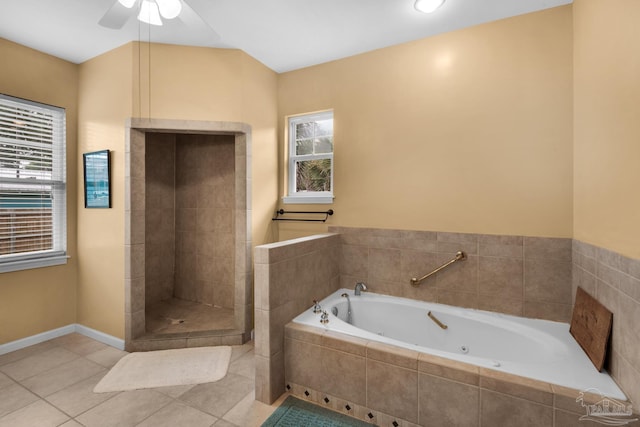 bathroom featuring separate shower and tub, tile patterned floors, and a wealth of natural light