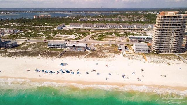 bird's eye view with a beach view and a water view