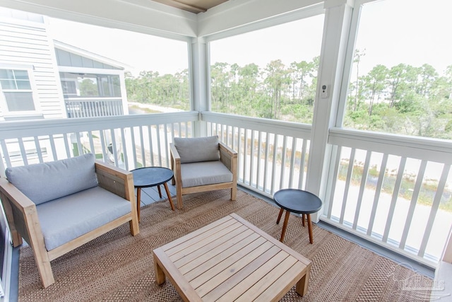 sunroom / solarium featuring plenty of natural light