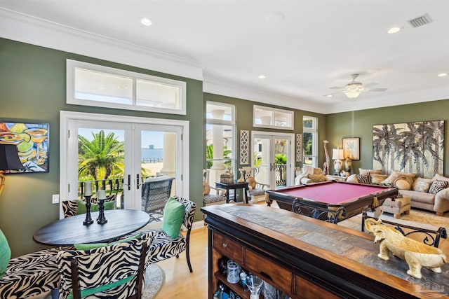 recreation room with recessed lighting, visible vents, french doors, light wood finished floors, and crown molding