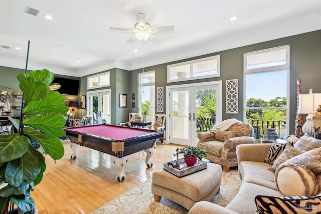 recreation room with ceiling fan, billiards, crown molding, french doors, and light hardwood / wood-style floors