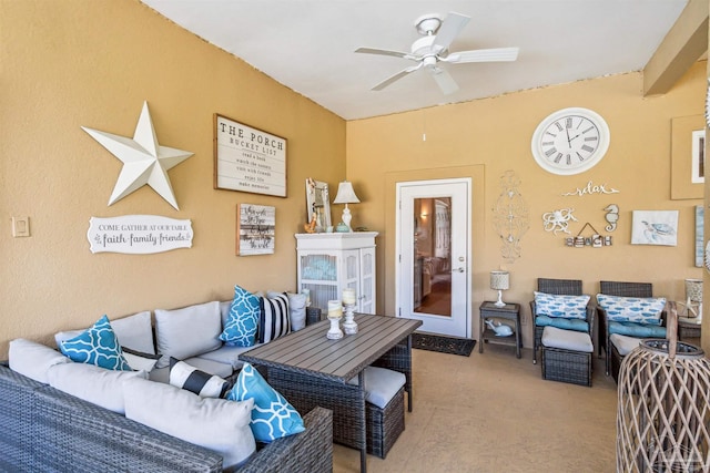 living room featuring light carpet and ceiling fan