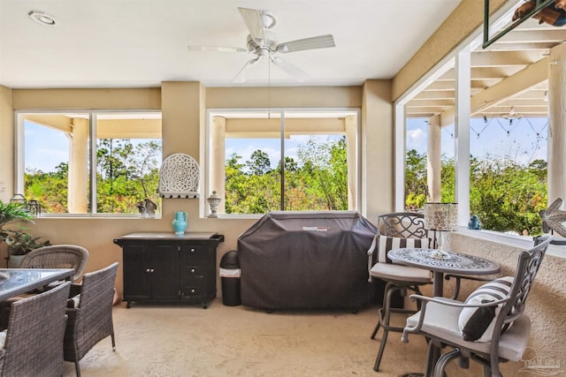 sunroom / solarium with ceiling fan