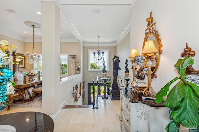 entryway featuring a chandelier, light tile patterned flooring, recessed lighting, baseboards, and ornamental molding