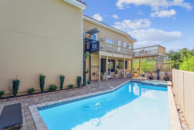 view of swimming pool with a patio area