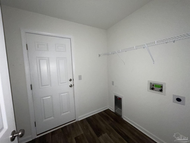 washroom featuring hookup for an electric dryer, washer hookup, and dark hardwood / wood-style floors