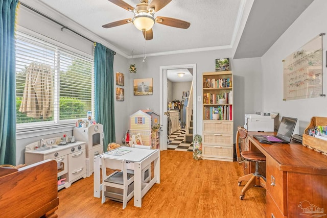 2803 Venetian Way, Gulf Breeze, FL 32563 - home office with a ceiling fan, light wood finished floors, and ornamental molding