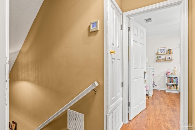 2803 Venetian Way, Gulf Breeze, FL 32563 - corridor featuring light wood-style floors and baseboards