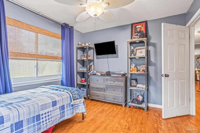 2803 Venetian Way, Gulf Breeze, FL 32563 - bedroom featuring wood finished floors and ceiling fan