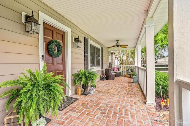 2803 Venetian Way, Gulf Breeze, FL 32563 - porch featuring a ceiling fan
