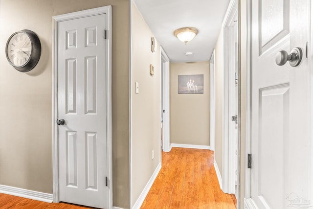 2803 Venetian Way, Gulf Breeze, FL 32563 - corridor with light wood finished floors and baseboards