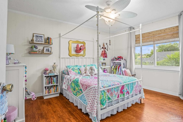 2803 Venetian Way, Gulf Breeze, FL 32563 - bedroom with wood finished floors, baseboards, ornamental molding, and a ceiling fan