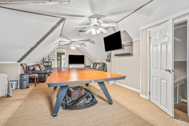 2803 Venetian Way, Gulf Breeze, FL 32563 - rec room featuring a textured ceiling, a ceiling fan, carpet flooring, vaulted ceiling, and baseboards