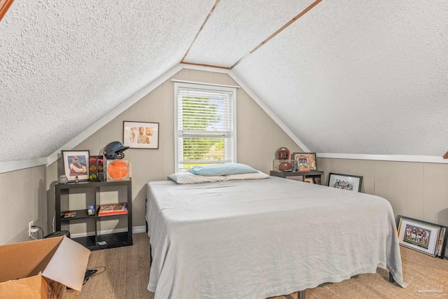 2803 Venetian Way, Gulf Breeze, FL 32563 - bedroom with a textured ceiling, carpet floors, and lofted ceiling