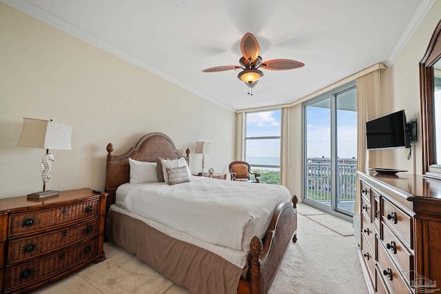 850 Ft Pickens Rd Unit 540, Pensacola Beach, FL 32561 - bedroom featuring ornamental molding, access to outside, ceiling fan, light carpet, and expansive windows