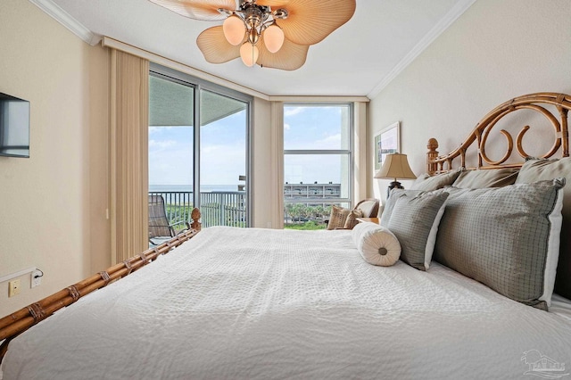 bedroom featuring crown molding, a water view, access to exterior, a wall of windows, and ceiling fan