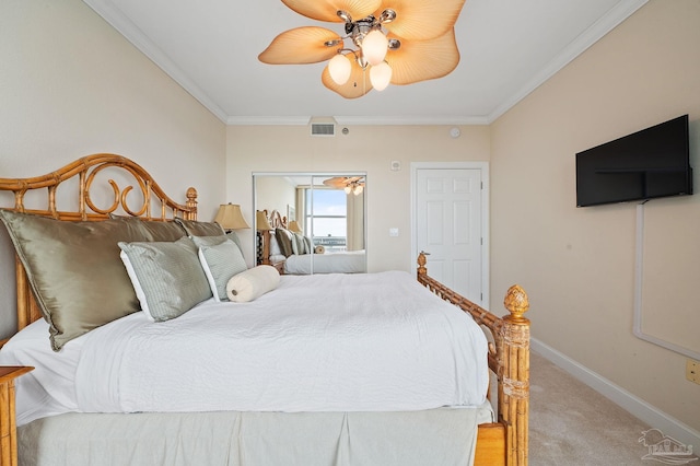 850 Ft Pickens Rd Unit 540, Pensacola Beach, FL 32561 - bedroom featuring visible vents, baseboards, ornamental molding, a ceiling fan, and light colored carpet