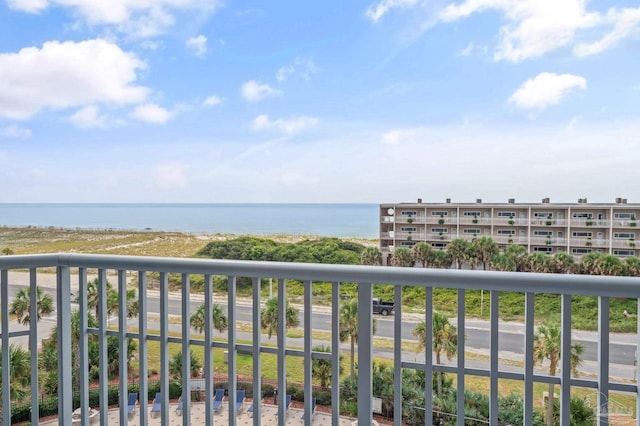 balcony featuring a water view