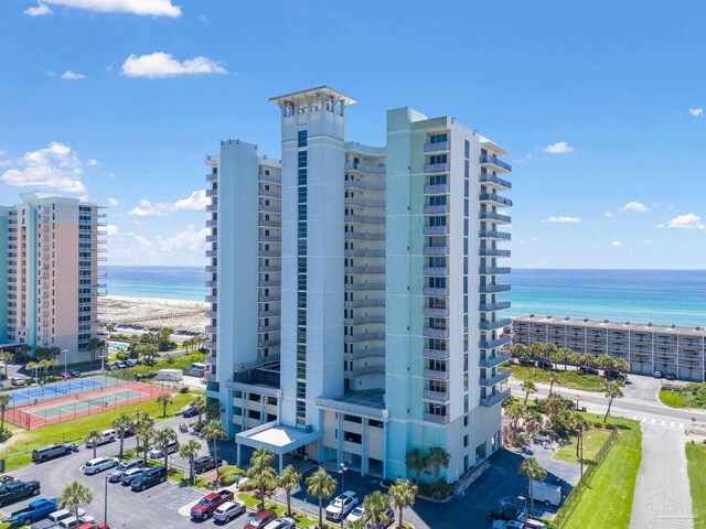 view of building exterior featuring a water view