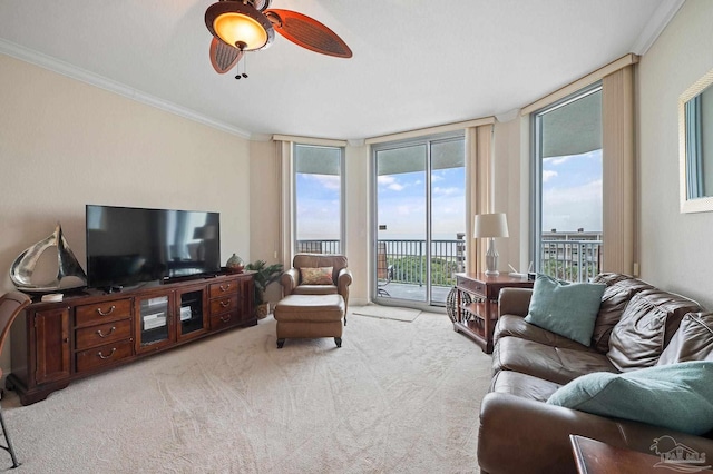 850 Ft Pickens Rd Unit 540, Pensacola Beach, FL 32561 - living room featuring ornamental molding, carpet, a wall of windows, and ceiling fan