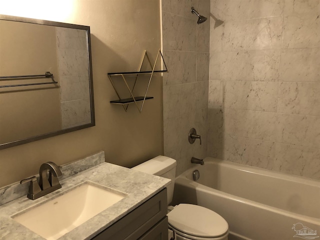 full bath with tub / shower combination, vanity, and toilet