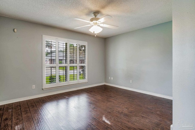 unfurnished room featuring a textured ceiling, ceiling fan, and dark hardwood / wood-style floors