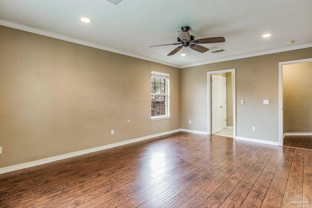 empty room featuring ceiling fan, hardwood / wood-style floors, crown molding, and a textured ceiling