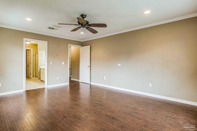 spare room featuring ceiling fan, crown molding, a textured ceiling, and light wood-type flooring