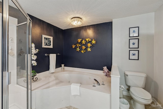 bathroom featuring toilet, a tub with jets, a shower stall, and a textured ceiling