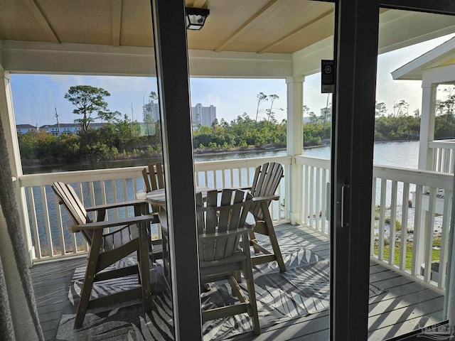 deck featuring a water view