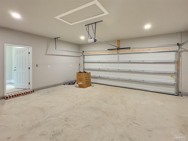 5773 Trevino Dr, Milton, FL 32570 - garage featuring a garage door opener and recessed lighting