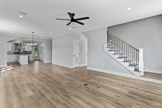 9616 Indian Stone Ct Lot 8, Navarre, FL 32566 - unfurnished living room with recessed lighting, visible vents, and ceiling fan with notable chandelier